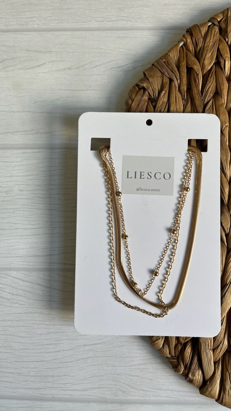 Collar cadena triple dorado